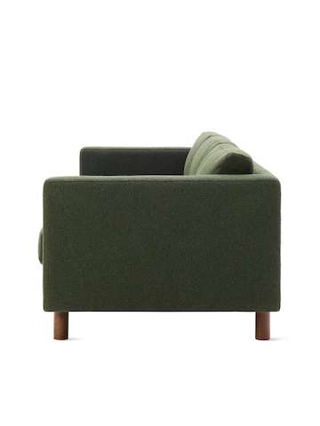 Side view of three seater Lispenard Sofa, 17 inches in dark green textile and 6 inch walnut legs.