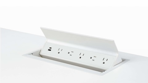 USB-A port, USB-C port, and five A/C power outlets on an embedded table power source.