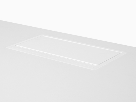 A Logic G1200 power port in the closed position, its lid flush with the work surface.