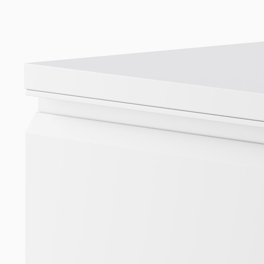 Close up of a light gray Meridian Storage lateral file with bevel pulls, viewed from an angle.