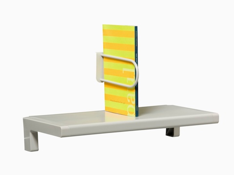 A small shelf holds an upright catalog.