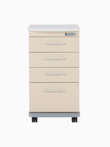 A Mora casework four-drawer supply cart in a light ash finish with a white solid surface top.