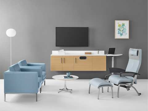 Wall-mounted Mora System casework in a healthcare lounge.