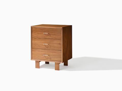 Nelson Basic Cabinet in walnut with three drawers, wavy pulls, and standard square legs.