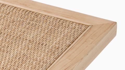 Close up detail of the cane top of a Nelson Cane Bench.