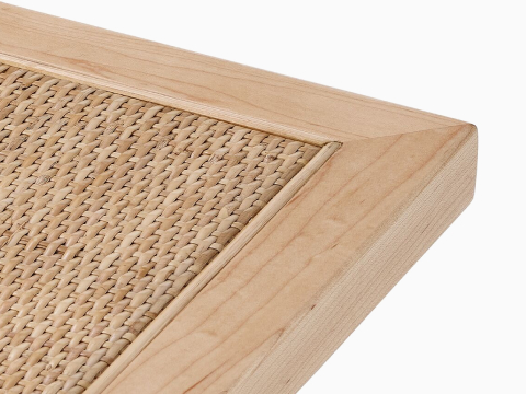 Close up detail of the cane top of a Nelson Cane Bench.