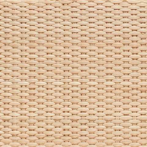 A close-up view of the Natural Cane material swatch.