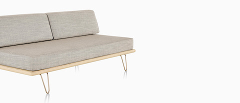 A light gray Nelson Daybed in the sofa position, viewed from a 45-degree angle. 