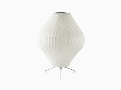 A large Nelson Pear Tripod table lamp.
