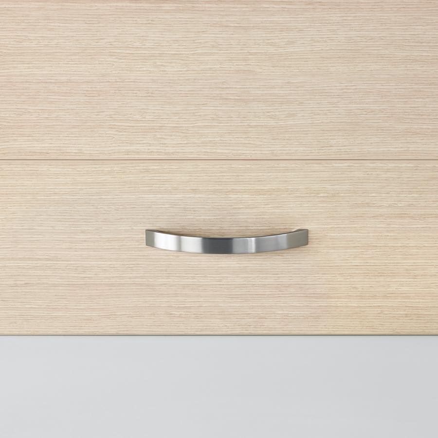 A close-up view of the arc pull in a silver finish.