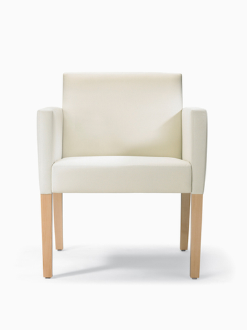 A front view of a Brava 862 Chair with maple frame, upholstered arm caps, and white textile.