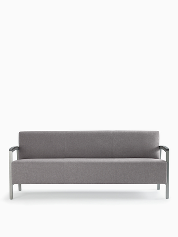 Front view of a gray Brava Modern Lounge Seating sofa with solid surface arm caps.