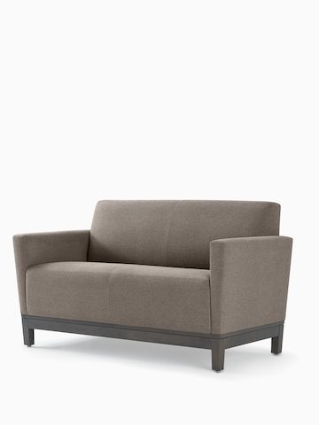 Front three-quarter view of Brava Platform Settee on wood base. Select to go to the Brava Platform Sofas product page.