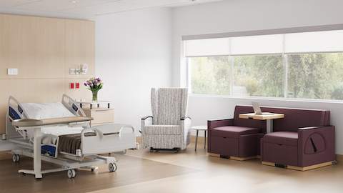 A premium private patient room in a hospital with Culla Recliner and Merge 2 Flop Sofa.