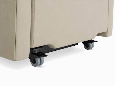 Culla Reclining Glider in beige upholstery, with locking casters.
