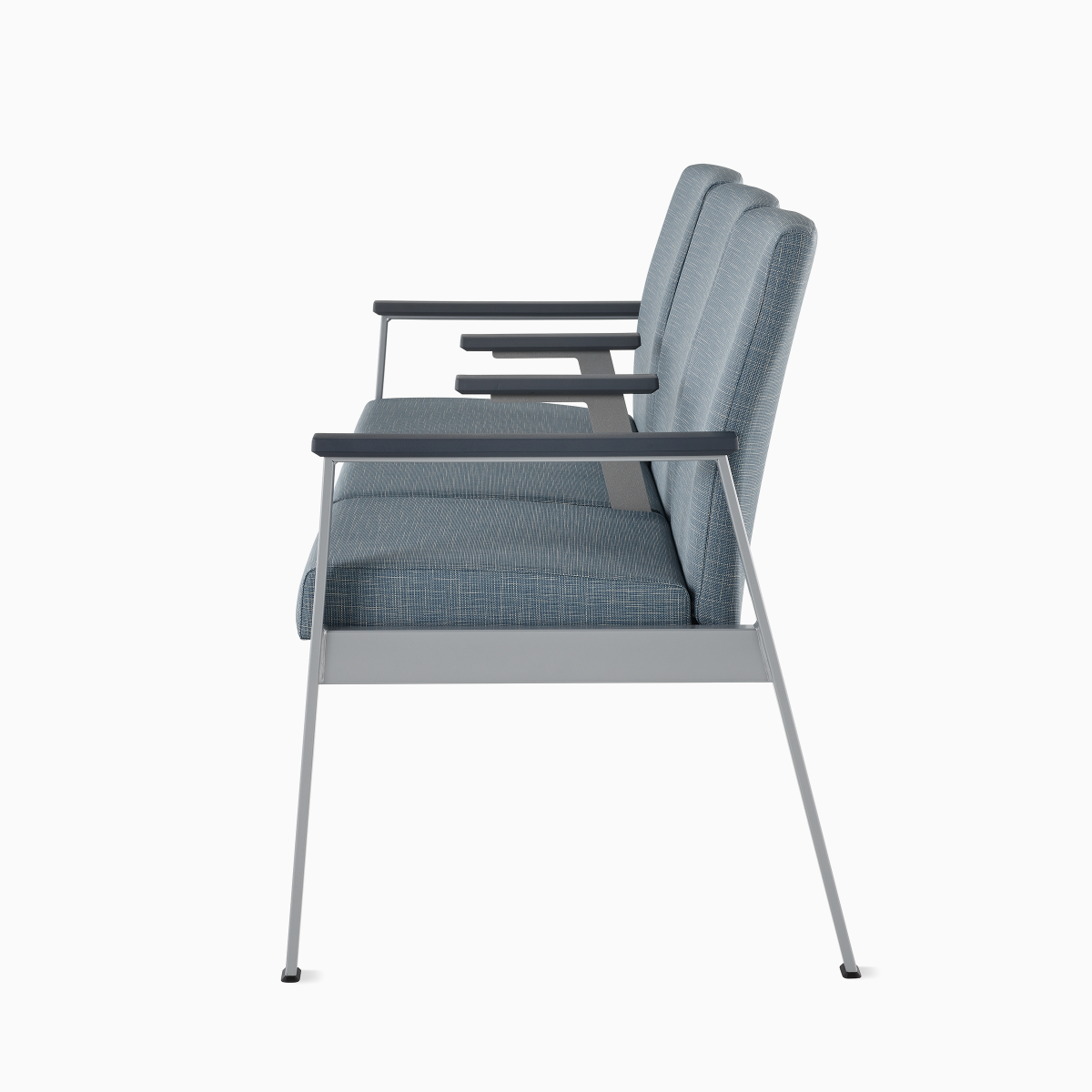 Side view of Easton Multiple Seating with three seats, intervening arms, blue upholstery, metallic silver frame, and gray arm caps.