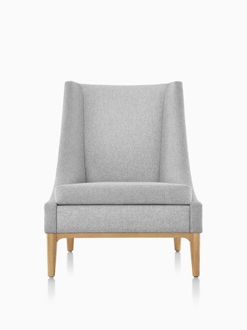 Iris Lounge Chair in a light gray textile with an oak base.
