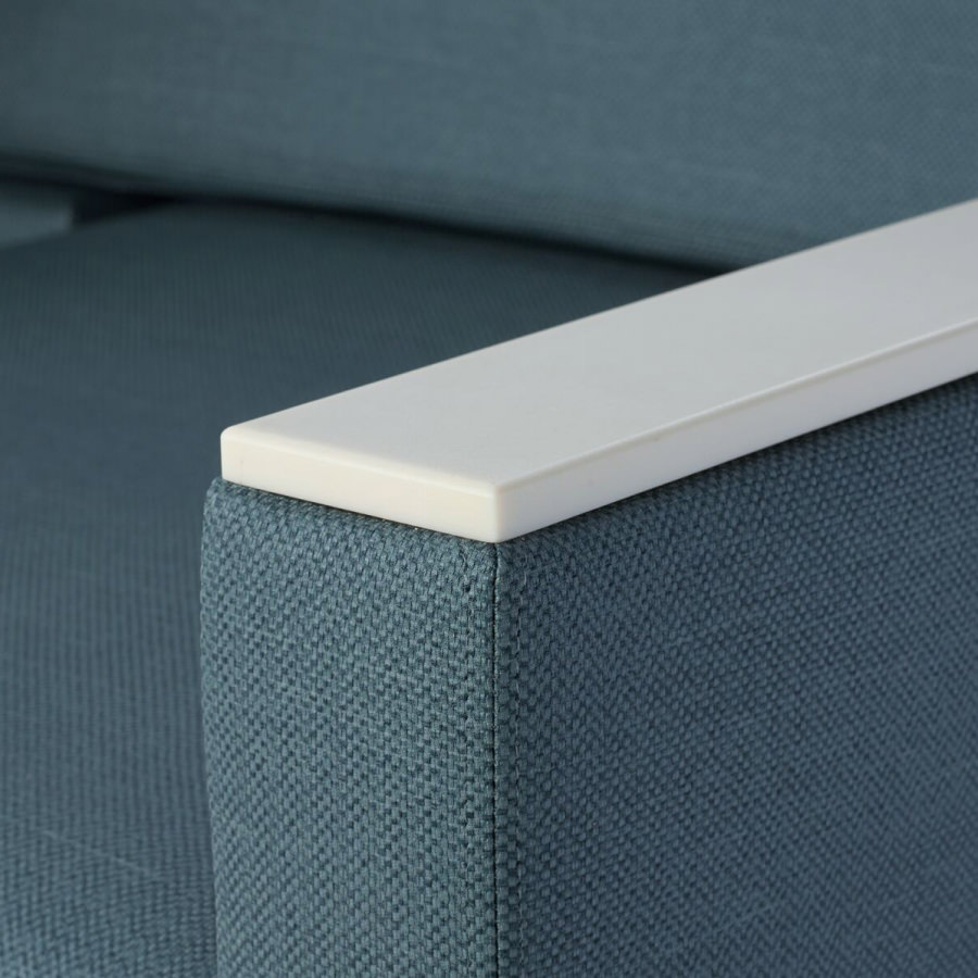 Nemschoff Merge 2 Flop Sofa in dark blue textile with white solid surface arm cap.