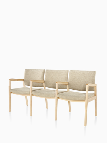 Monarch Multiple Seating three-seater with intervening arms and legs in tan textile with solid hardwood frame.