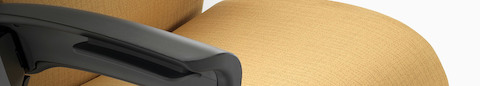Detail of the seat and arm of a Nemschoff Nala Patient Chair.