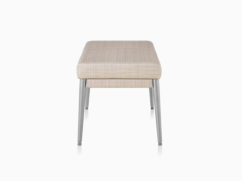 Side view of Palisade Bench in tan striped textile.