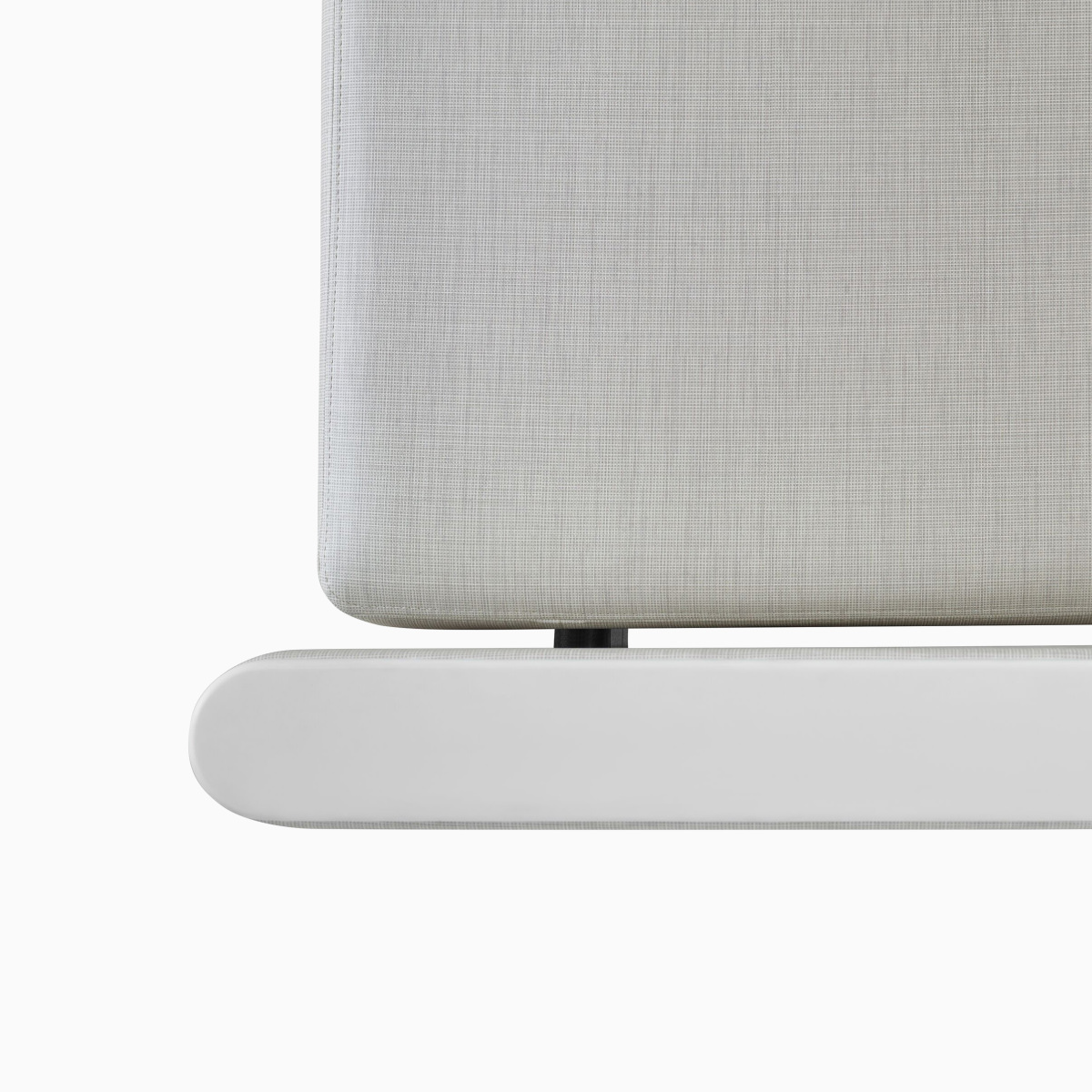 Detail of the wipe-out design gap between the arm and the seat cushion on a Nemschoff Palisade Flop Sofa.
