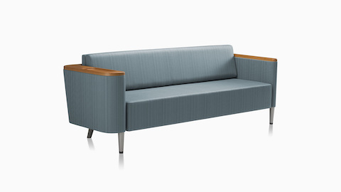 A Nemschoff Palisade Flop sofa in blue textile with wood arms caps and metal legs.