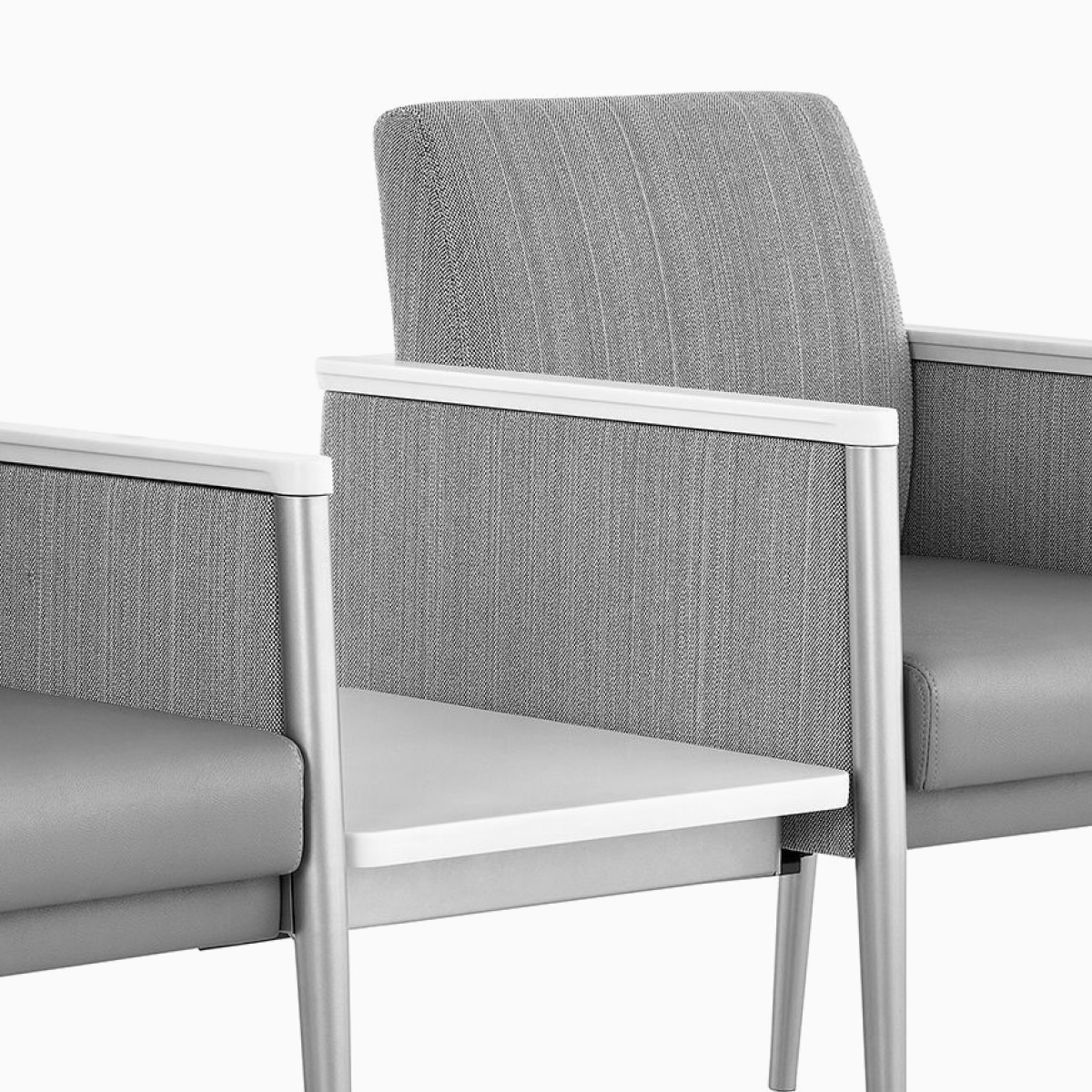 Nemschoff Palisade Multiple Seating with a cropped view of the center table and one seat.