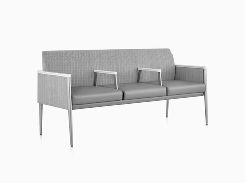 Nemschoff Palisade Multiple seating in a gray upholstery with two intervening arms and white arm caps.