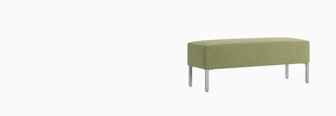 A Riva lounge bench in green textile, large rectangle shape, viewed at an angle.