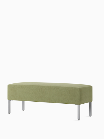 A Riva lounge bench in green textile, large rectangle shape, viewed at an angle. Select to view the Riva Bench product page.