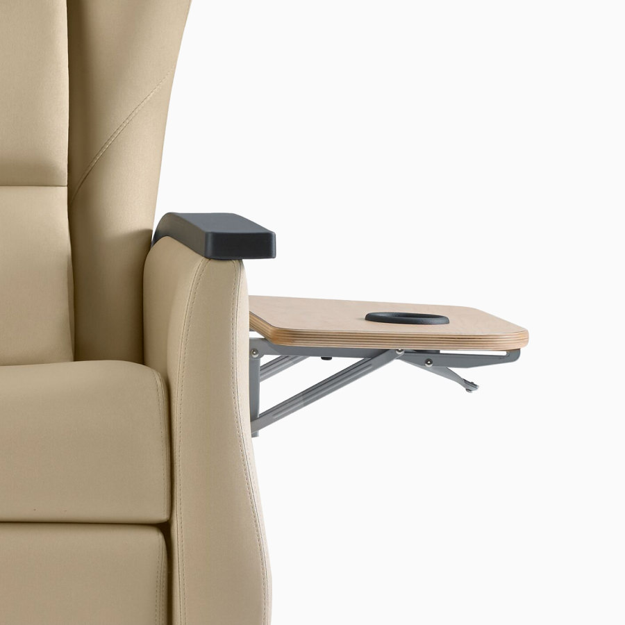 Front view of Nemschoff Serenity Recliner with optional accessory table extended.
