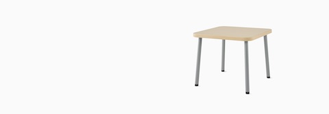 Three-quarter view of a square Valor Side Table with an ash wood laminate finish and silver legs.