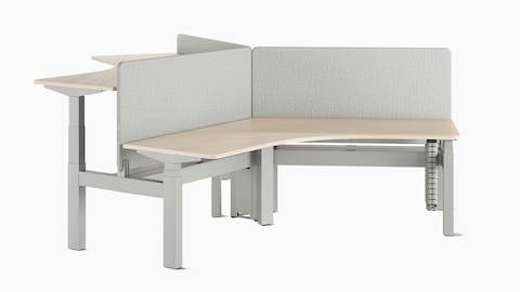 Cluster of three Nevi Link workstations with 120 degree worksurfaces and Bound Screens.