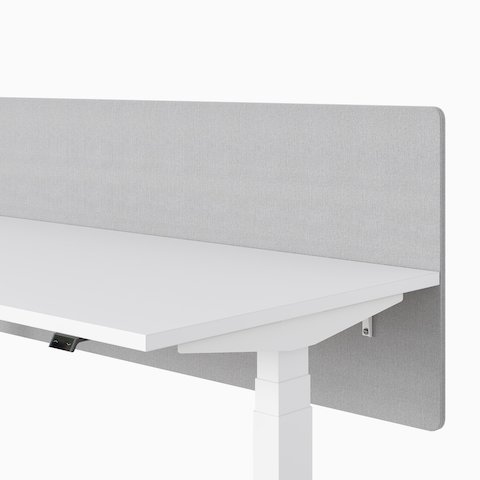 A close-up view of the privacy screen on a Nevi Sit-Stand Desk.