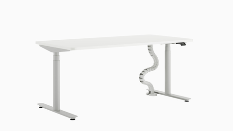Un bureau assis-debout Nevi aux pieds ronds.