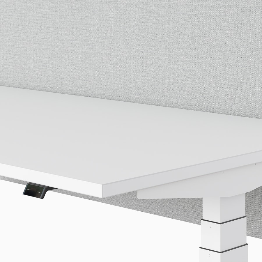 A close-up view of a Surface Touch Switch on a Nevi Sit-Stand Desk.