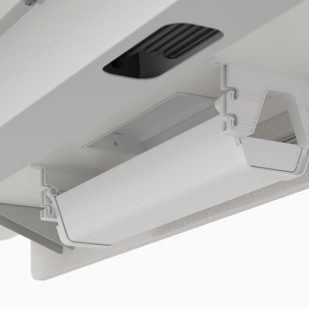Freestanding upper cable tray detail on Nevi Sit-to-Stand Desk.