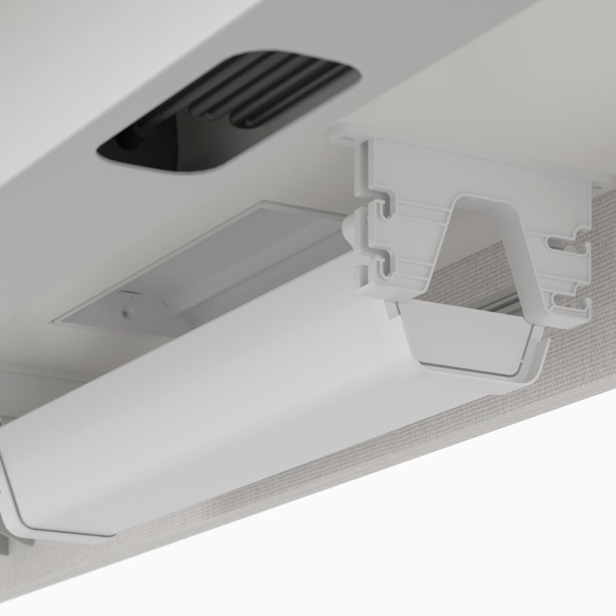Freestanding upper cable tray detail on Nevi Sit-to-Stand Desk.