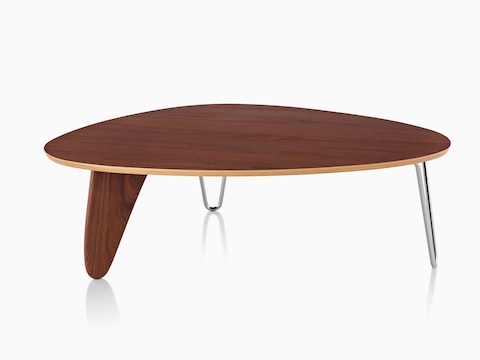 A Noguchi Rudder Table with a walnut finish. 
