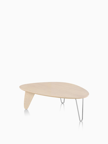 A Noguchi Rudder Table with a light wood finish. Select to go to the Noguchi Rudder Table product page. 