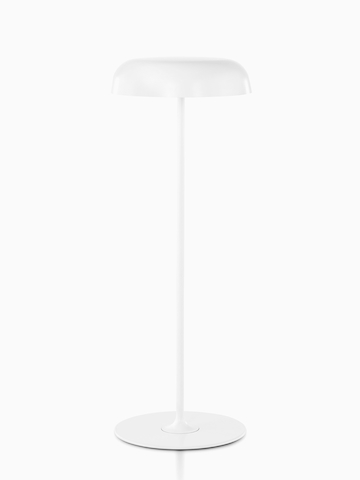A white Ode sofa lamp.