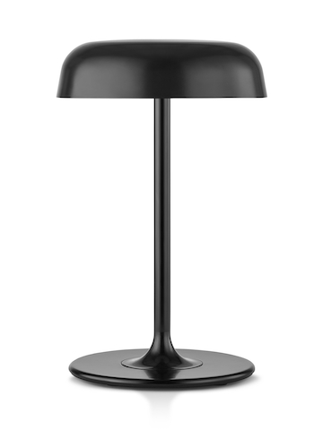 A black Ode table lamp.