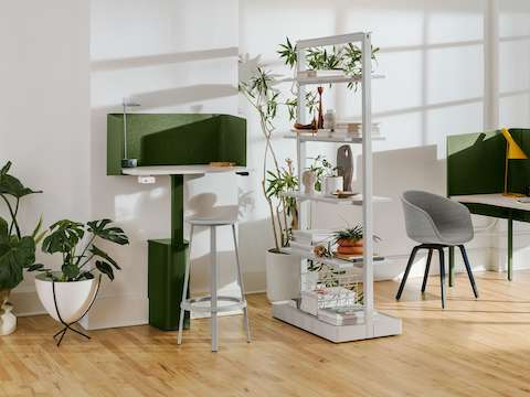 A green, single OE1 Micro Pack with a grey OE1 Agile Wall with full shelves and a green OE1 Nook in the background.