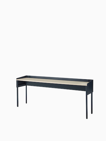 Dark blue, single sided OE1 Communal Table with light brown surface, viewed from an angle.