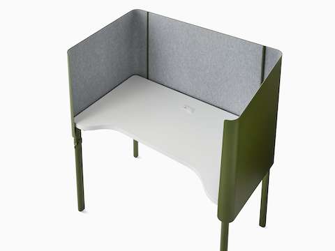 Green OE1 Nook with white surface, grey liner and glides, viewed at an angle from above.