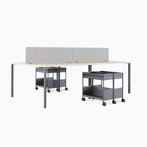 An OE1 Project Table with OE1 Movable Screens in a benching configuration with OE1 Storage Trolleys.