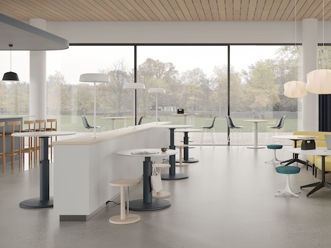 Community socialization area with OE1 Sit-to-Stand Tables, OE1 Freestanding Curtains, occasional tables and sofas.