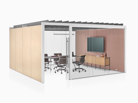 An enclosed Overlay meeting room with two glass walls and two laminate walls with a conference table and four chairs inside.