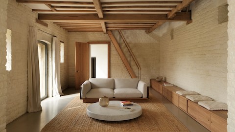 Pawson Drift Sofa in oak and white textile in an oak clad room at the Pawson Home Farm